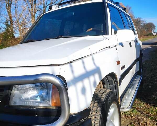 Білий Сузукі Вітара, об'ємом двигуна 1.6 л та пробігом 401 тис. км за 4800 $, фото 7 на Automoto.ua