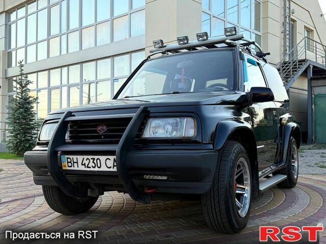 Черный Сузуки Витара, объемом двигателя 1.6 л и пробегом 185 тыс. км за 3500 $, фото 2 на Automoto.ua