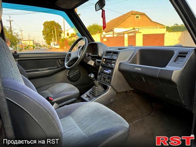 Черный Сузуки Витара, объемом двигателя 1.6 л и пробегом 185 тыс. км за 3500 $, фото 5 на Automoto.ua