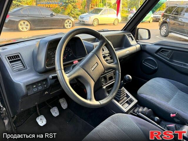 Черный Сузуки Витара, объемом двигателя 1.6 л и пробегом 185 тыс. км за 3500 $, фото 6 на Automoto.ua