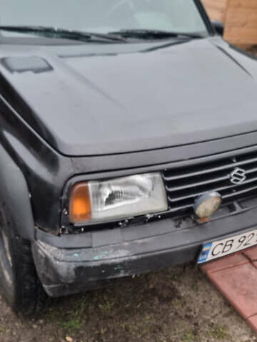 Черный Сузуки Витара, объемом двигателя 1.59 л и пробегом 303 тыс. км за 4950 $, фото 13 на Automoto.ua