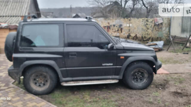 Черный Сузуки Витара, объемом двигателя 1.59 л и пробегом 303 тыс. км за 4950 $, фото 14 на Automoto.ua