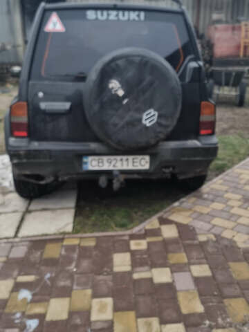 Черный Сузуки Витара, объемом двигателя 1.59 л и пробегом 303 тыс. км за 4950 $, фото 15 на Automoto.ua