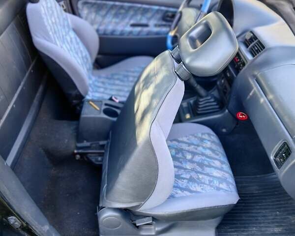 Черный Сузуки Витара, объемом двигателя 1.6 л и пробегом 185 тыс. км за 5500 $, фото 8 на Automoto.ua