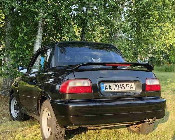 Черный Сузуки Витара, объемом двигателя 1.6 л и пробегом 185 тыс. км за 5500 $, фото 36 на Automoto.ua