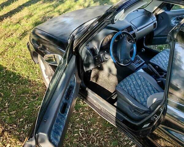 Черный Сузуки Витара, объемом двигателя 1.6 л и пробегом 185 тыс. км за 5500 $, фото 5 на Automoto.ua