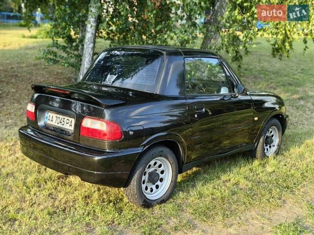 Черный Сузуки Витара, объемом двигателя 1.6 л и пробегом 185 тыс. км за 5500 $, фото 29 на Automoto.ua