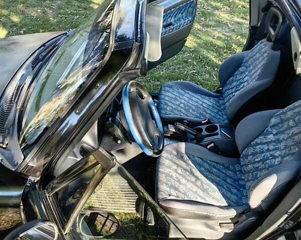 Черный Сузуки Витара, объемом двигателя 1.6 л и пробегом 185 тыс. км за 5500 $, фото 4 на Automoto.ua