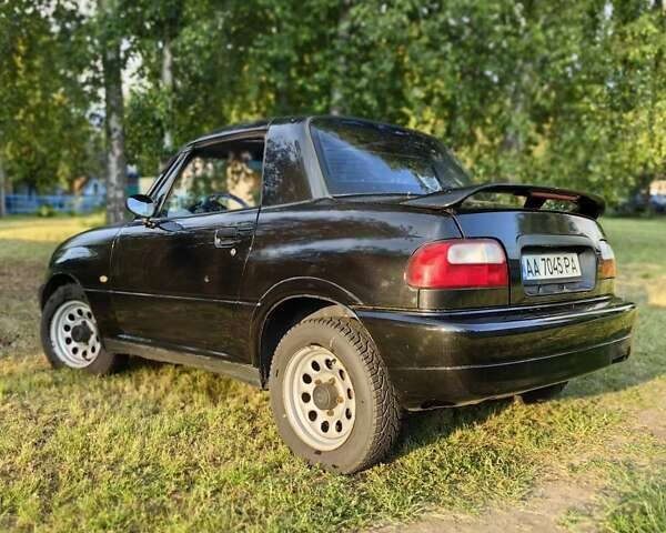 Черный Сузуки Витара, объемом двигателя 1.6 л и пробегом 185 тыс. км за 5500 $, фото 26 на Automoto.ua