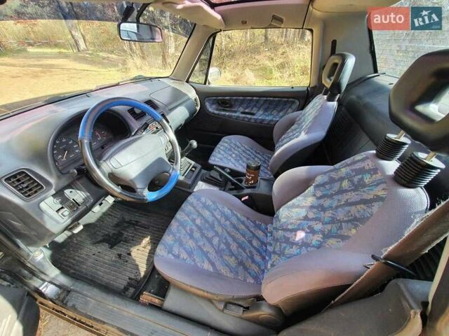 Черный Сузуки Витара, объемом двигателя 1.6 л и пробегом 185 тыс. км за 5500 $, фото 19 на Automoto.ua