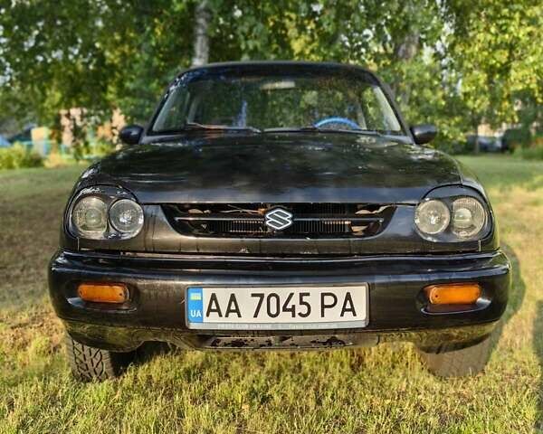 Черный Сузуки Витара, объемом двигателя 1.6 л и пробегом 185 тыс. км за 5500 $, фото 28 на Automoto.ua