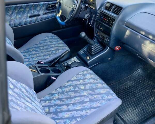 Черный Сузуки Витара, объемом двигателя 1.6 л и пробегом 185 тыс. км за 5500 $, фото 7 на Automoto.ua