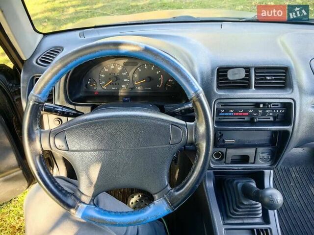 Черный Сузуки Витара, объемом двигателя 1.6 л и пробегом 185 тыс. км за 5500 $, фото 11 на Automoto.ua