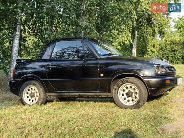 Черный Сузуки Витара, объемом двигателя 1.6 л и пробегом 185 тыс. км за 5500 $, фото 21 на Automoto.ua