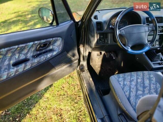 Черный Сузуки Витара, объемом двигателя 1.6 л и пробегом 185 тыс. км за 5500 $, фото 10 на Automoto.ua