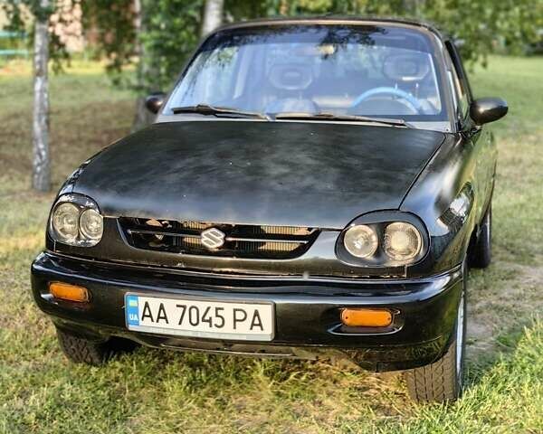 Черный Сузуки Витара, объемом двигателя 1.6 л и пробегом 185 тыс. км за 5500 $, фото 33 на Automoto.ua