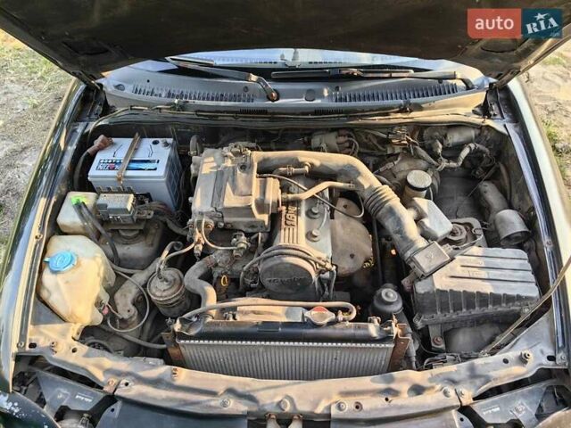 Черный Сузуки Витара, объемом двигателя 1.6 л и пробегом 185 тыс. км за 5500 $, фото 34 на Automoto.ua