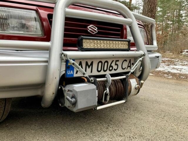 Красный Сузуки Витара, объемом двигателя 1.6 л и пробегом 91 тыс. км за 4500 $, фото 4 на Automoto.ua