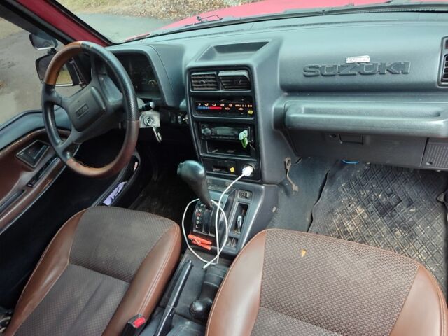 Красный Сузуки Витара, объемом двигателя 1.6 л и пробегом 290 тыс. км за 5800 $, фото 6 на Automoto.ua