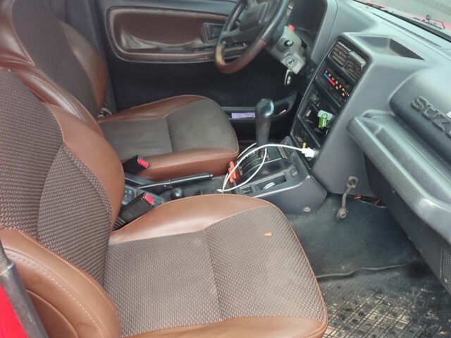 Красный Сузуки Витара, объемом двигателя 1.6 л и пробегом 290 тыс. км за 5800 $, фото 7 на Automoto.ua