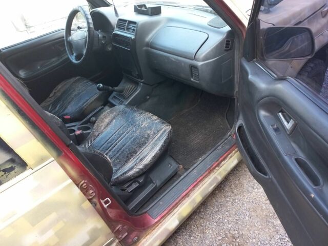 Сузукі Вітара 1996 у Тараще на Automoto.ua Червоний Сузукі Вітара, об'ємом двигуна 1.8 л та пробігом 1 тис. км за 3200 $, фото 15 на Automoto.ua