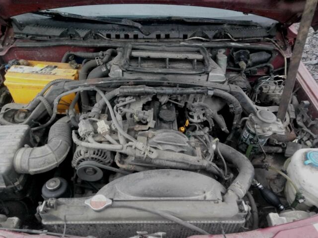 Красный Сузуки Витара, объемом двигателя 2 л и пробегом 350 тыс. км за 4500 $, фото 3 на Automoto.ua