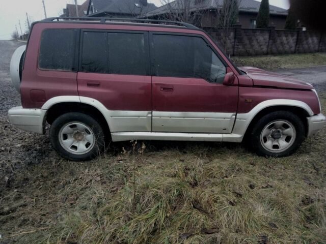 Красный Сузуки Витара, объемом двигателя 2 л и пробегом 350 тыс. км за 4500 $, фото 5 на Automoto.ua