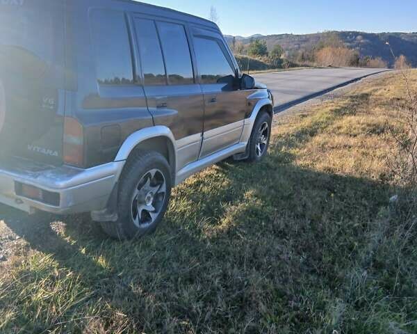 Синий Сузуки Витара, объемом двигателя 2 л и пробегом 390 тыс. км за 3100 $, фото 2 на Automoto.ua