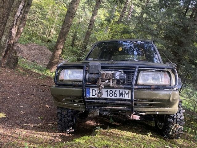 Зеленый Сузуки Витара, объемом двигателя 1.6 л и пробегом 200 тыс. км за 2100 $, фото 1 на Automoto.ua