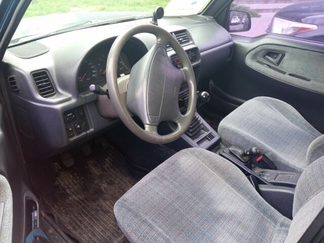 Зеленый Сузуки Витара, объемом двигателя 2 л и пробегом 200 тыс. км за 3542 $, фото 12 на Automoto.ua