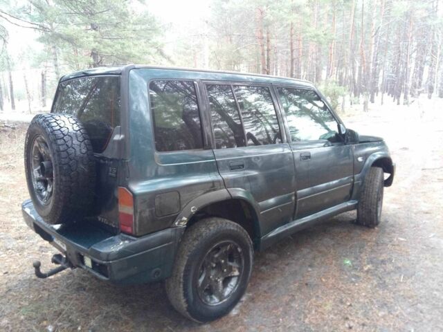 Зеленый Сузуки Витара, объемом двигателя 2 л и пробегом 480 тыс. км за 3800 $, фото 4 на Automoto.ua