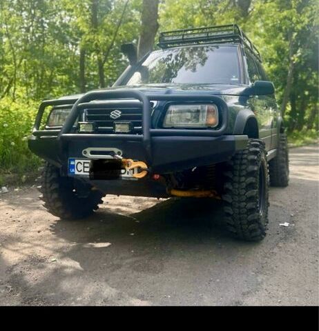 Зеленый Сузуки Витара, объемом двигателя 2 л и пробегом 177 тыс. км за 10000 $, фото 1 на Automoto.ua