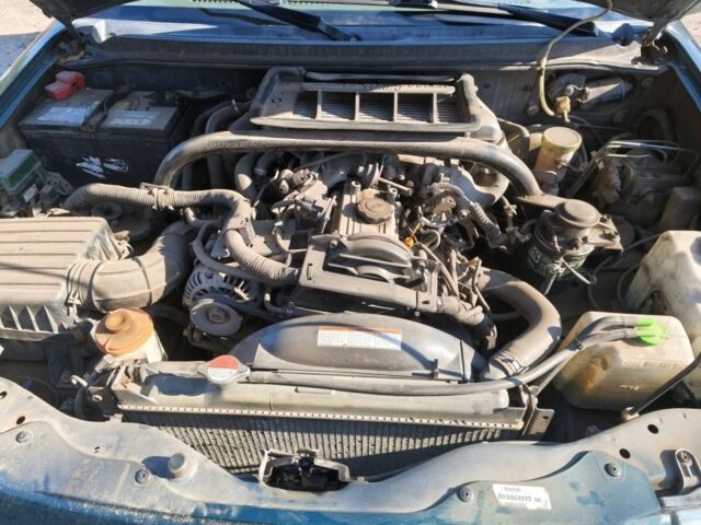 Зелений Сузукі Вітара, об'ємом двигуна 2 л та пробігом 350 тис. км за 3950 $, фото 1 на Automoto.ua