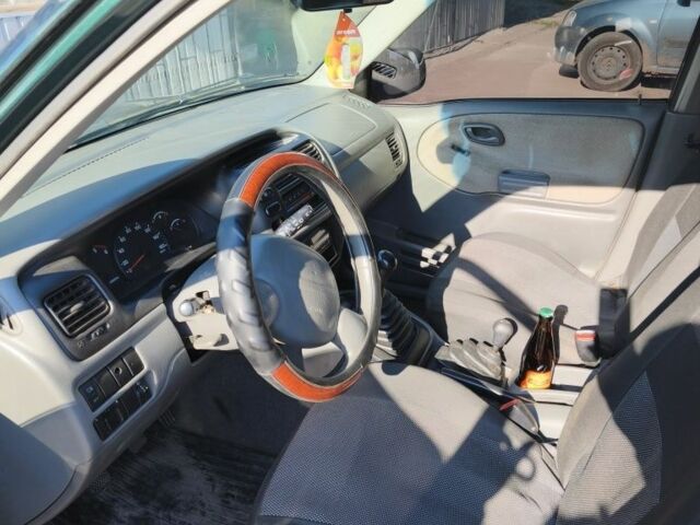 Зелений Сузукі Вітара, об'ємом двигуна 2 л та пробігом 350 тис. км за 3950 $, фото 5 на Automoto.ua