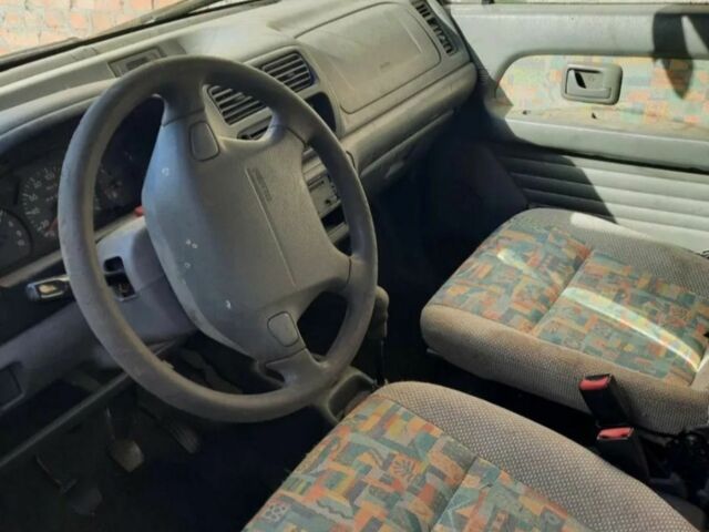 Красный Сузуки Вагон Р, объемом двигателя 1 л и пробегом 221 тыс. км за 650 $, фото 5 на Automoto.ua