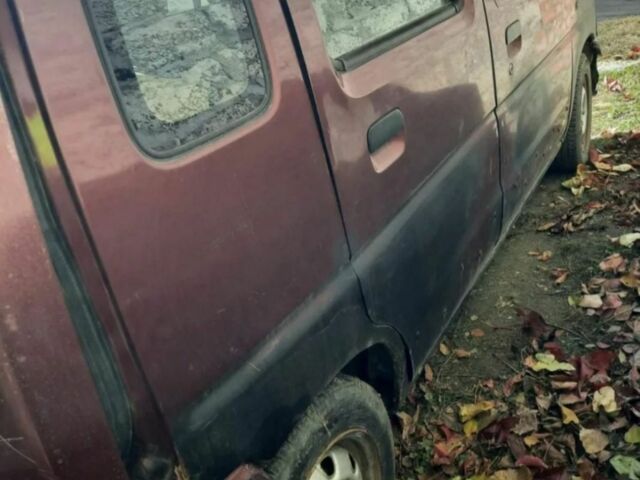 Красный Сузуки Вагон Р, объемом двигателя 1 л и пробегом 221 тыс. км за 650 $, фото 1 на Automoto.ua