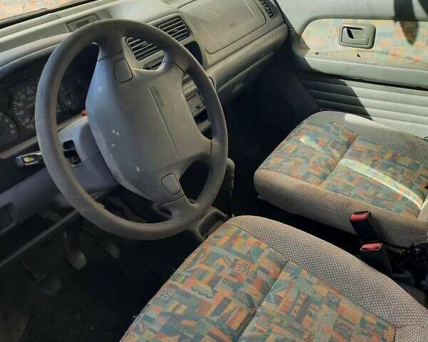 Красный Сузуки Вагон Р, объемом двигателя 1.2 л и пробегом 200 тыс. км за 750 $, фото 5 на Automoto.ua