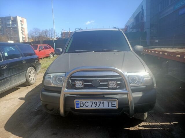 Серый Сузуки ХЛ7, объемом двигателя 2.7 л и пробегом 260 тыс. км за 4000 $, фото 1 на Automoto.ua