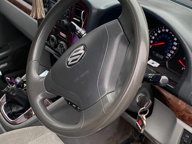 Серый Сузуки ХЛ7, объемом двигателя 2 л и пробегом 190 тыс. км за 3500 $, фото 1 на Automoto.ua