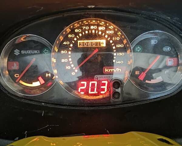 Черный Сузуки Burgman 150, объемом двигателя 0.15 л и пробегом 31 тыс. км за 1500 $, фото 16 на Automoto.ua