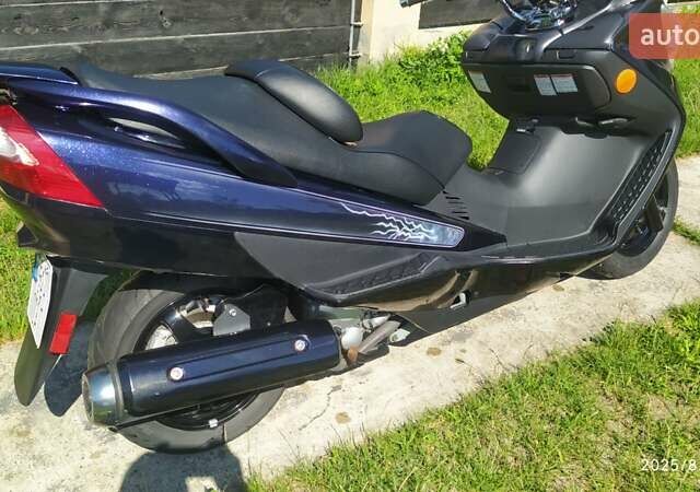 Синий Сузуки Burgman 400, объемом двигателя 0.39 л и пробегом 7 тыс. км за 2300 $, фото 25 на Automoto.ua
