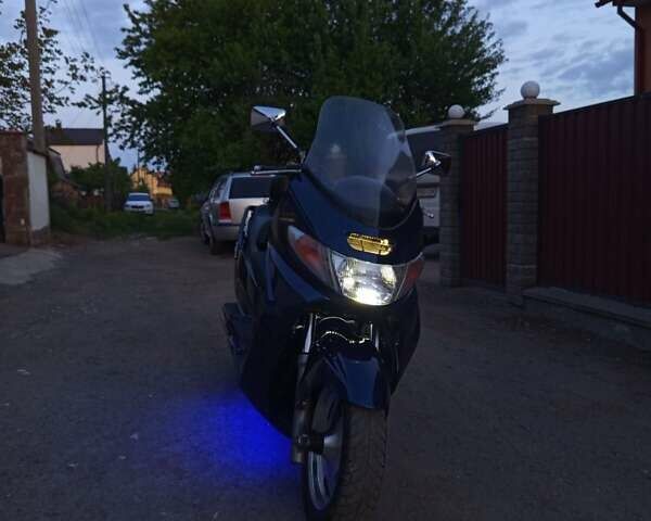 Синий Сузуки Burgman 400, объемом двигателя 0.4 л и пробегом 60 тыс. км за 1999 $, фото 12 на Automoto.ua