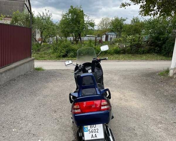 Синий Сузуки Burgman 400, объемом двигателя 0.4 л и пробегом 60 тыс. км за 1999 $, фото 5 на Automoto.ua