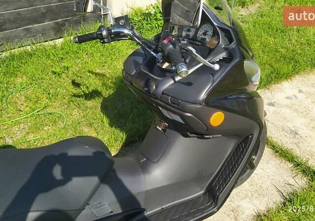 Синий Сузуки Burgman 400, объемом двигателя 0.39 л и пробегом 7 тыс. км за 2300 $, фото 28 на Automoto.ua