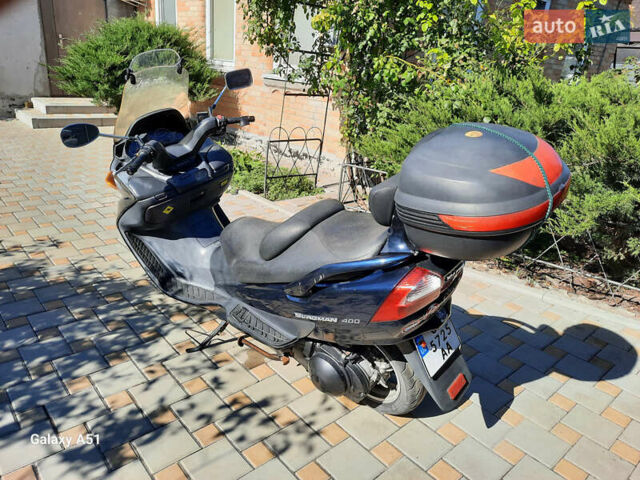 Синій Сузукі Burgman 400, об'ємом двигуна 0.39 л та пробігом 90 тис. км за 1800 $, фото 2 на Automoto.ua