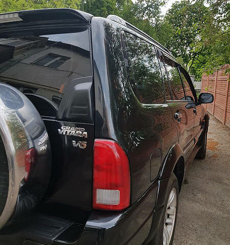 Черный Сузуки Grand Vitara XL7, объемом двигателя 2.7 л и пробегом 250 тыс. км за 6000 $, фото 11 на Automoto.ua