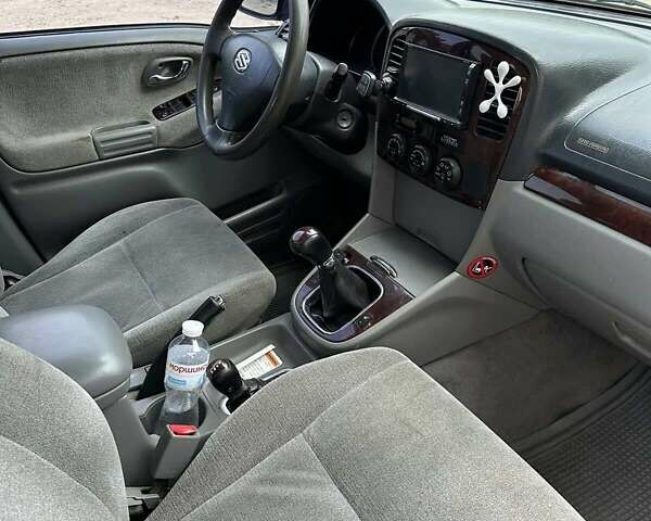 Синий Сузуки Grand Vitara XL7, объемом двигателя 2.7 л и пробегом 209 тыс. км за 6000 $, фото 22 на Automoto.ua