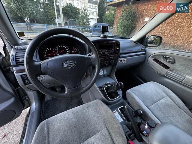 Зелений Сузукі Grand Vitara XL7, об'ємом двигуна 2 л та пробігом 310 тис. км за 4326 $, фото 4 на Automoto.ua