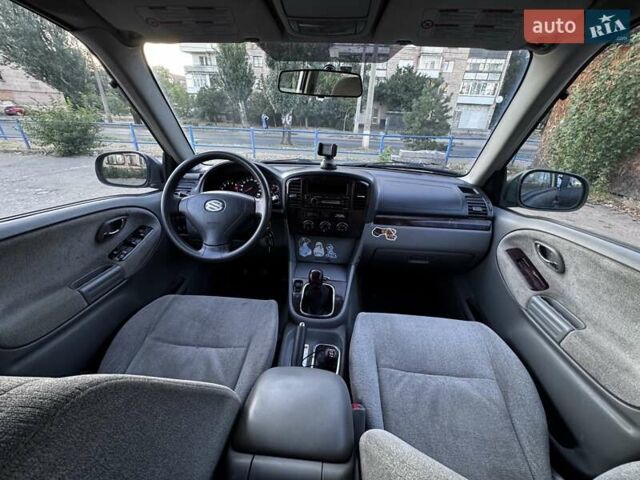 Зелений Сузукі Grand Vitara XL7, об'ємом двигуна 2 л та пробігом 310 тис. км за 4326 $, фото 6 на Automoto.ua