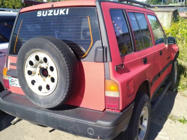 Красный Сузуки Sidekick, объемом двигателя 1.6 л и пробегом 284 тыс. км за 2000 $, фото 3 на Automoto.ua